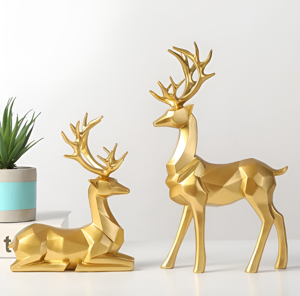 Velvoro decoratiebeeld – 2-delig rendierfiguur set van hars in elegante kleuren