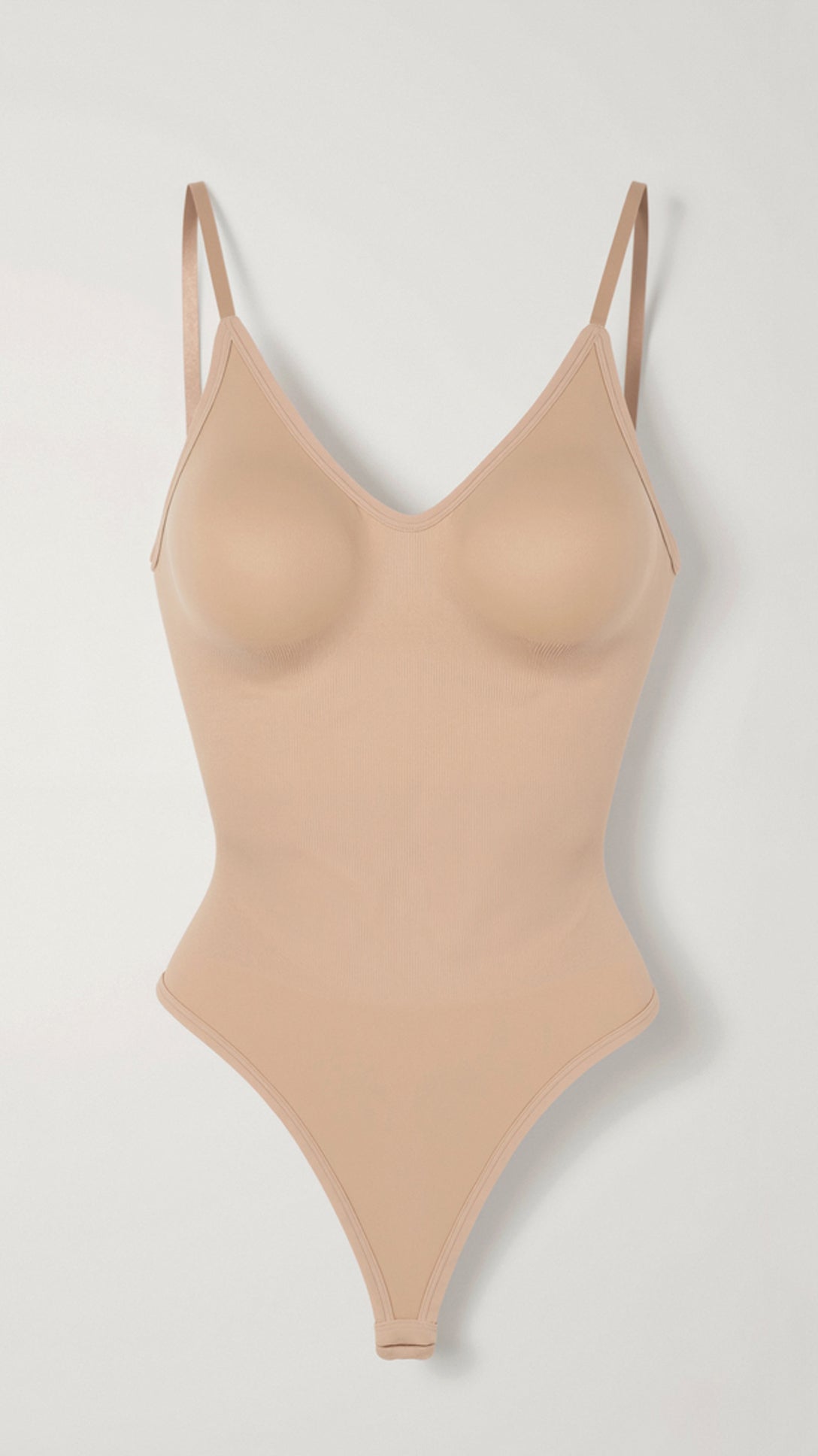 Naadloze bodysuit met lage rug en tanga-kruis - ultra-gladde, nauwelijks merkbare pasvorm