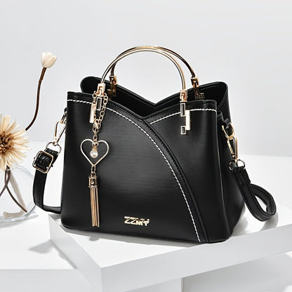 Dames handtas – kleurblok design, kwast details, ruim, stijlvol