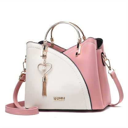 Dames handtas – kleurblok design, kwast details, ruim, stijlvol
