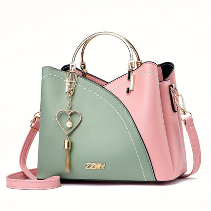 Dames handtas – kleurblok design, kwast details, ruim, stijlvol