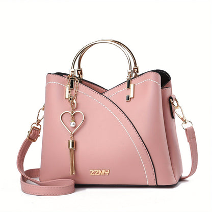 Dames handtas – kleurblok design, kwast details, ruim, stijlvol
