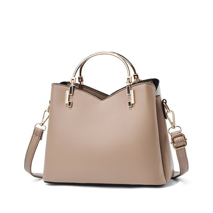 Dames handtas – kleurblok design, kwast details, ruim, stijlvol