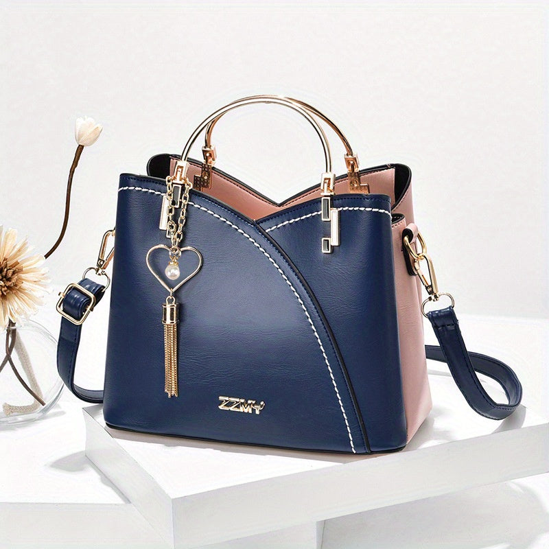 Dames handtas – kleurblok design, kwast details, ruim, stijlvol