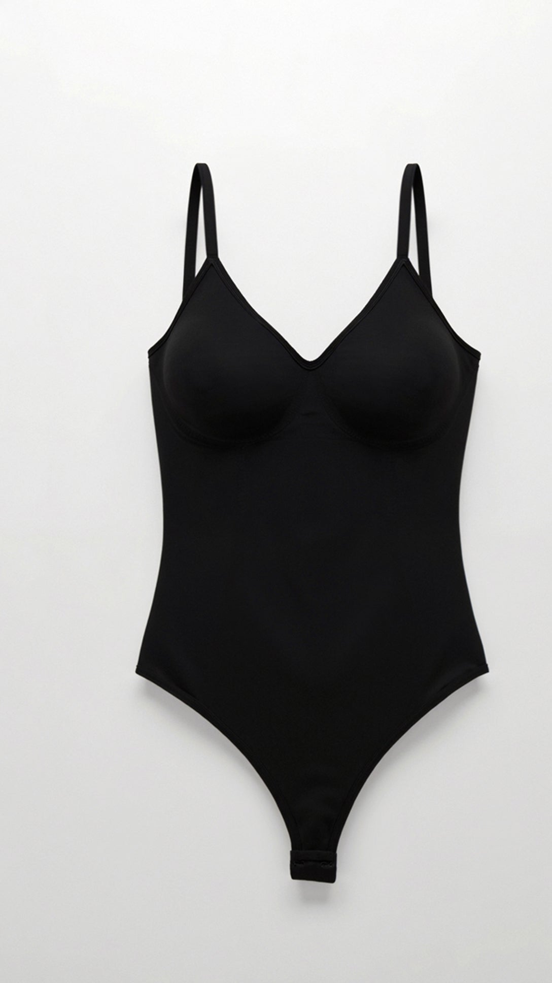 Naadloze bodysuit met lage rug en tanga-kruis - ultra-gladde, nauwelijks merkbare pasvorm